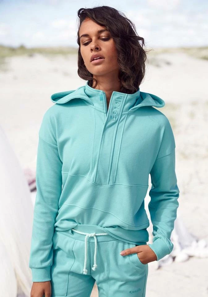 Bench. Kapuzensweatshirt mit Stehkragen und Reißverschluss Schwarz, Türkis 1 Bench. Kapuzensweatshirt mit Stehkragen und Reißverschluss Schwarz, Türkis