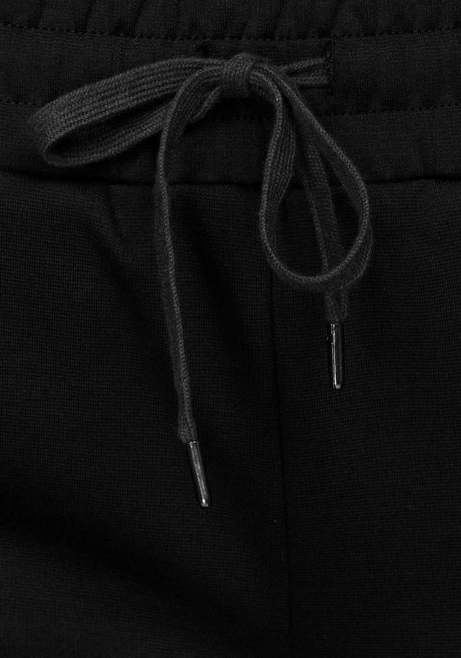 Bench. Relaxhose mit schmalem Bein und Zipper am Saum 8 Bench. Relaxhose mit schmalem Bein und Zipper am Saum – Bild 8